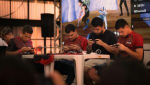 Mobile esports players competing at a LAN tournament